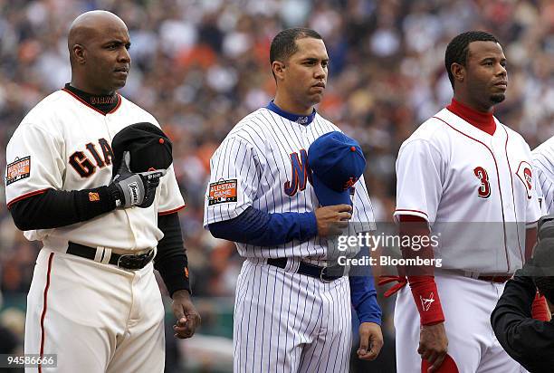 National League players, from left, Barry Bonds of the San Francisco Giants, Carlos Beltran of the New York Mets, and Ken Griffey Jr. Of the...