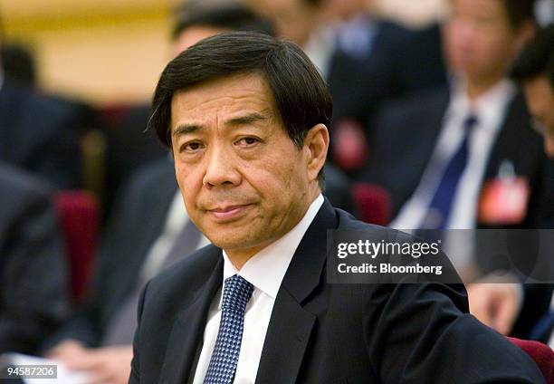 Bo Xilai, China's minister of commerce attends a meeting at Beijing's Great Hall of the People, during the 17th Communist Party Congress, on Tuesday,...