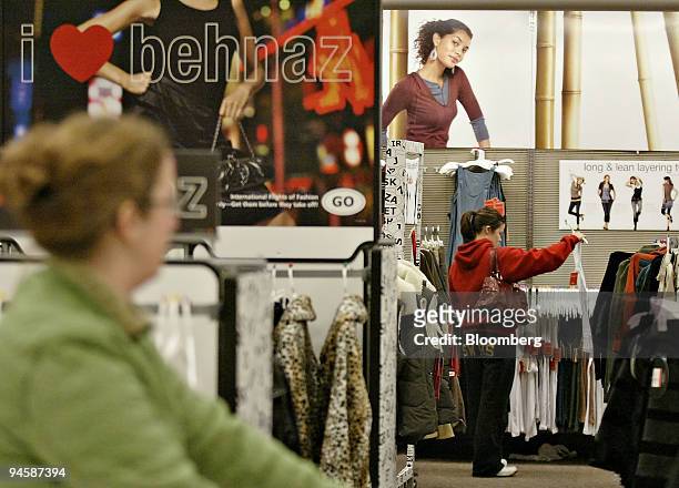 Shopper browses in the women's clothing section at a Target store in Columbus, Ohio Tuesday, November 14, 2006.Target Corp. And Wal-Mart Stores Inc.,...