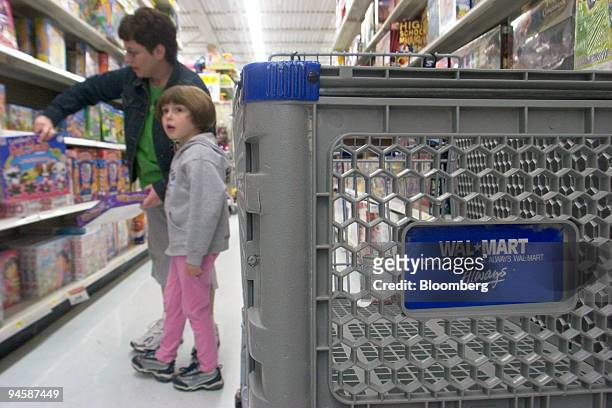 Julie Roy and her daughter Kelsey shop for toys inside a Framingham, Massachusetts Wal-Mart store on Tuesday, November 14, 2006. Target Corp. And...