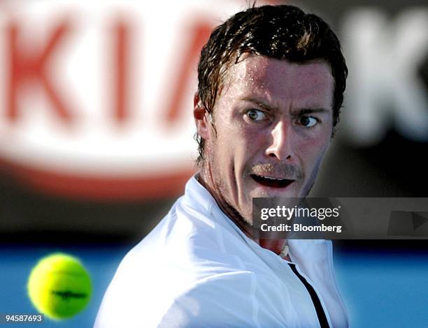 Marat Safin of Russia keeps his eye on the ball during his match against Ernests Gulbis of Latvia on day two of the Australian Open tennis tournament...