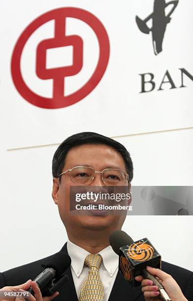 Li Lihui, vice chairman and president of the Bank of China Ltd., speaks to the media during a joint news conference with Fred Goodwin, chief...