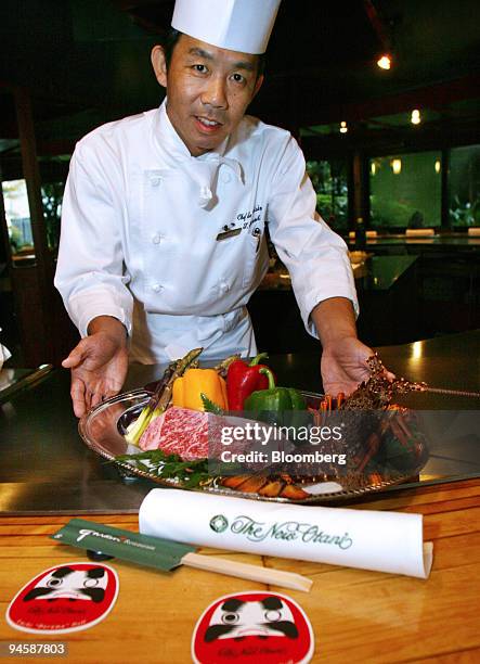 Chef Takanori Kanbe of New Otani Hotel Sekishin-tei shows off a plate of teppanyaki selections at the restaurant in Tokyo, Japan, on Tuesday,...