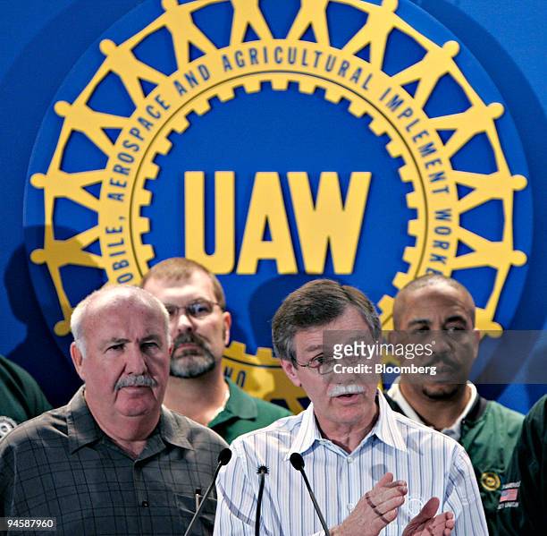 Ron Gettelfinger, president of the United Auto Workers, is flanked by members of the union's national bargaining council as he answers a question...