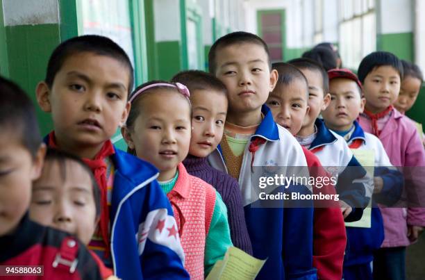 Group of school children line up to receive the vaccination against Hepatitis B in Ledu, Qinghai, China, on Monday, Sept. 17, 2007. Run by the Asian...