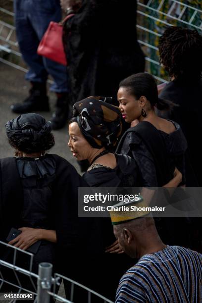 Family and friends arrive to the house of Winnie Mandela before her body is returned home in Soweto the day before the funeral for the anti-apartheid...