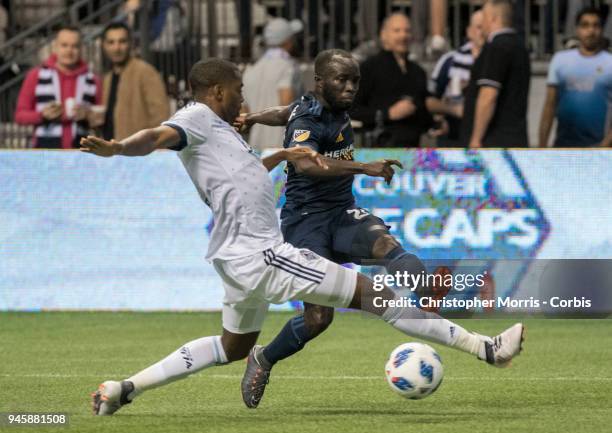 March 24: Vancouver Whitecaps defender Aaron Maund and Los Angeles Galaxy midfielder Ema Boateng at BC Place on March 24, 2018 in Vancouver, Canada.