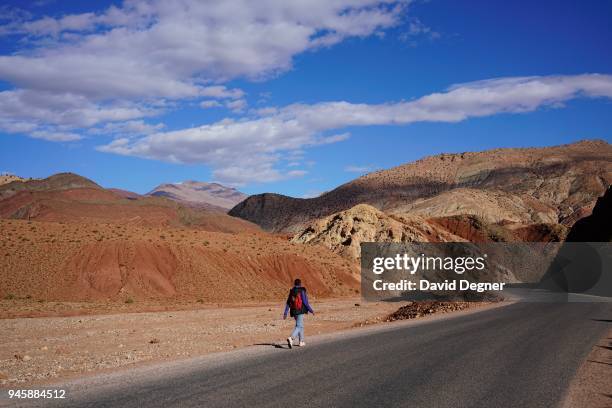 Child walks home from school through the mountains around Telouet, Morocco.