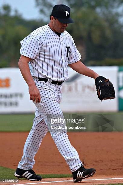 Roger Clemens, seven-time Cy Young Award winner, walks off the mound after pitching for the Class-A Tampa Yankees against the Fort Myers Miracle, the...