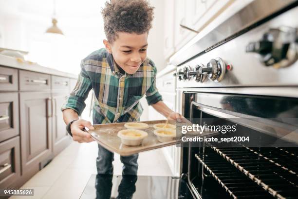 teenager baking cookies - kids cooking stock pictures, royalty-free photos & images