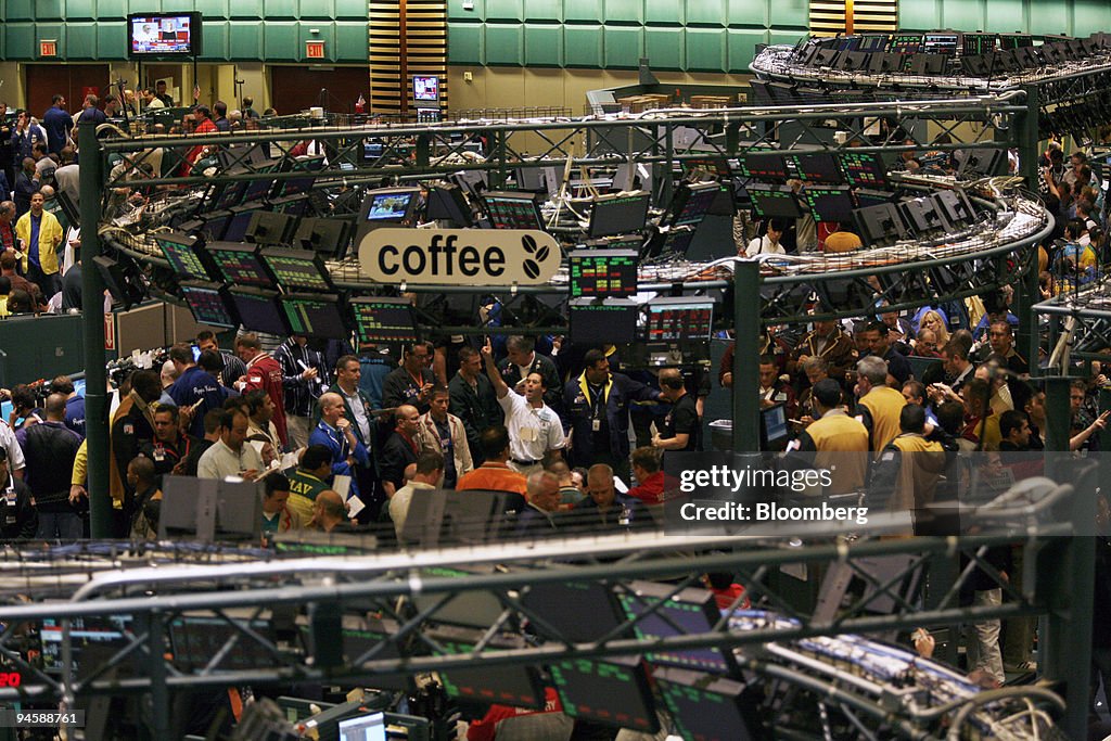 Traders work in the coffee pit at the New York Board of Trade