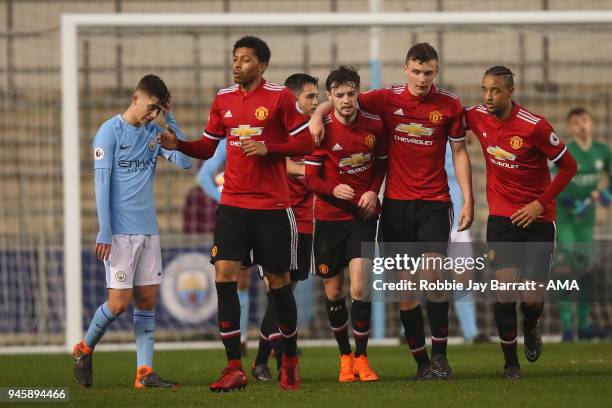 Indy Boonen of Manchester United celebrates after scoring a goal to make it 1-1 during the Premier League 2 match at Manchester City Football Academy...