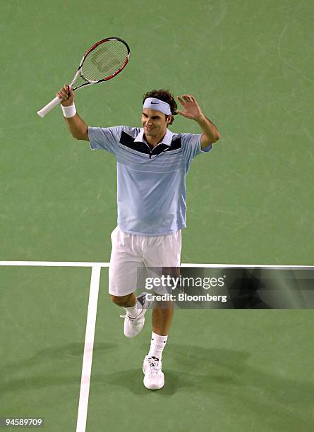 Roger Federer of Switzerland reacts to winning the game against Andy Roddick of the United States at the Australian Open Tennis Championships in...