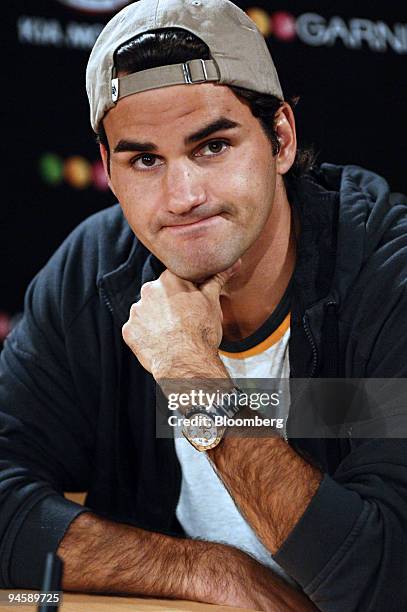 Roger Federer of Switzerland speaks to the media at the Australian Open Tennis Championships in Melbourne, Australia, Thursday, Jan. 25, 2007....