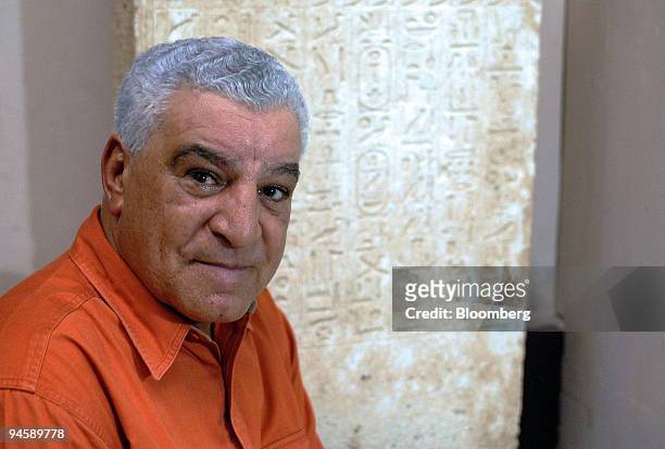 Zahi Hawass, secretary general of the Egyptian Supreme Council of Antiquities, poses in front of a 26th dynasty offering stela from Akhmim in Upper...