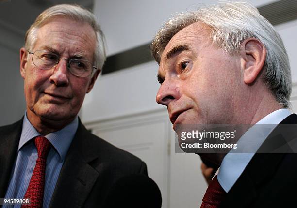 Labour Party lawmaker Michael Meacher, left, looks on as lawmaker John McDonnell, now the sole challenger of Gordon Brown for the position of prime...