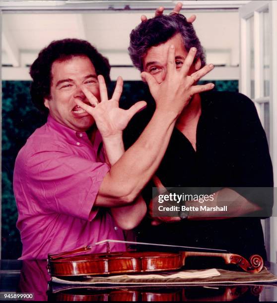 Violinists Itzhak Perlman and Pinchas Zukerman are photographed for BMG Classic in 1991 in New York City.