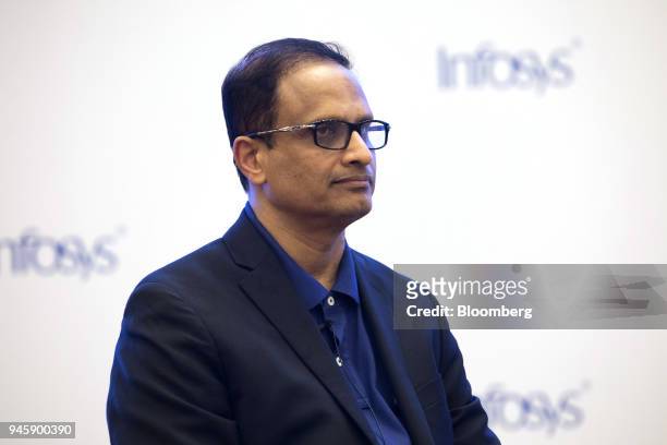 Pravin Rao, chief operating officer of Infosys Ltd., listens during a news conference in Bengaluru, India, on Friday, April 13, 2018. Infosys Chief...