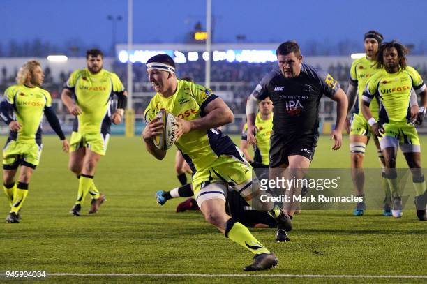 Ben Curry of Sale Sharks scores a try during the Aviva Premiership match between Newcastle Falcons and Sale Sharks at Kingston Park on April 13, 2018...