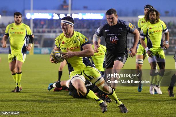 Ben Curry of Sale Sharks scores a try during the Aviva Premiership match between Newcastle Falcons and Sale Sharks at Kingston Park on April 13, 2018...
