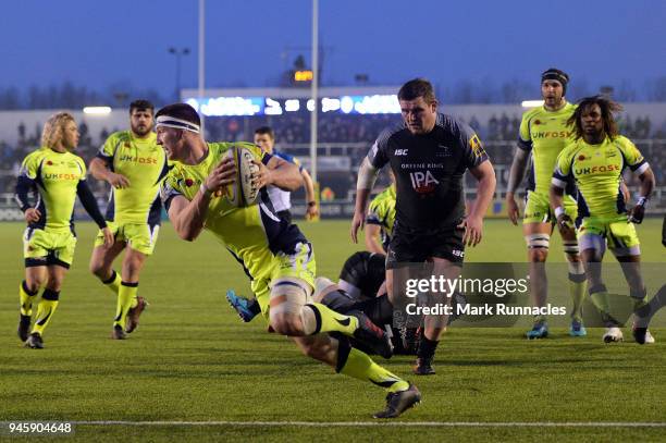 Ben Curry of Sale Sharks scores a try during the Aviva Premiership match between Newcastle Falcons and Sale Sharks at Kingston Park on April 13, 2018...