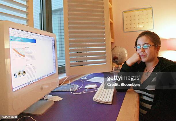 Tiffany Wheeler poses at her desk after receiving an environmental science lesson in her home, Friday, November 10 in New York. Tiffany Wheeler lives...