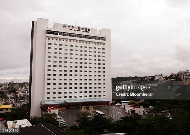 The Nikko Naha Grand Castle Hotel stands in Naha City, Japan, on Monday, March 19, 2007. Japan Airlines Corp., Asia's largest carrier by sales, sold...