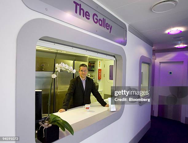 Yotel Operations Director Nigel Buchanan stands at the Galley reception area at the new Japanese-style Yotel at Gatwick airport, Gatwick, UK.,...