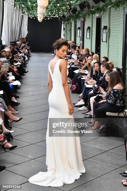 Model walks the runway at the Amsale Tribute Spring 2019 runway show at Gramercy Park Hotel on April 13, 2018 in New York City.