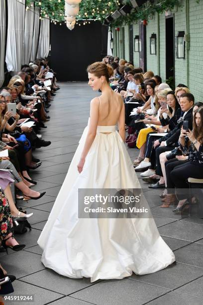 Model walks the runway at the Amsale Tribute Spring 2019 runway show at Gramercy Park Hotel on April 13, 2018 in New York City.