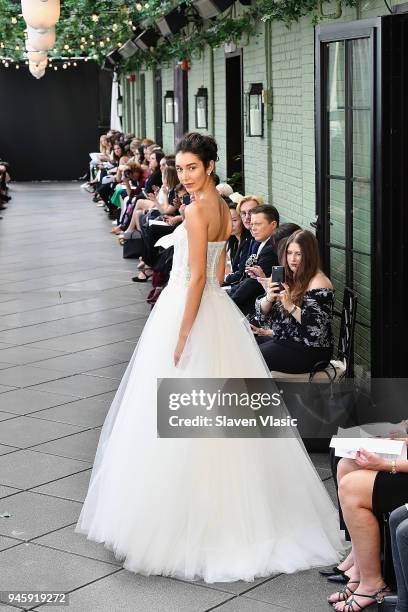 Model walks the runway at the Amsale Tribute Spring 2019 runway show at Gramercy Park Hotel on April 13, 2018 in New York City.