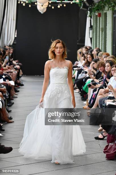 Model walks the runway at the Amsale Tribute Spring 2019 runway show at Gramercy Park Hotel on April 13, 2018 in New York City.