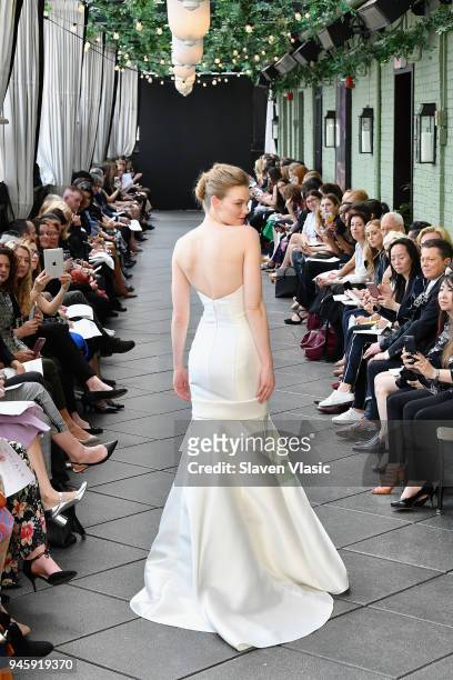 Model walks the runway at the Amsale Tribute Spring 2019 runway show at Gramercy Park Hotel on April 13, 2018 in New York City.