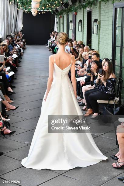 Model walks the runway at the Amsale Tribute Spring 2019 runway show at Gramercy Park Hotel on April 13, 2018 in New York City.