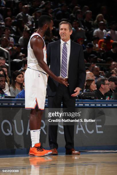 Head Coach Jeff Hornacek of the New York Knicks speak with Tim Hardaway Jr. #3 of the New York Knicks during the game against the Miami Heat on April...