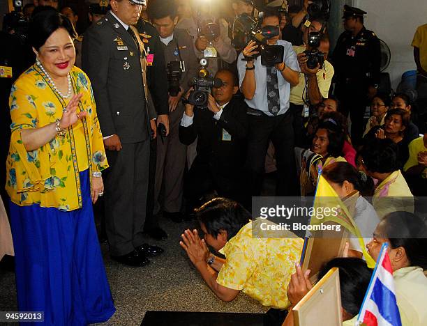 Thailand's Queen Sirikit gestures to well-wishers as she arrives at the Siriraj Hospital in Bangkok, Thailand, on Sunday, Oct. 14, 2007. Thai King...