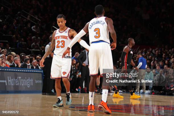 Trey Burke of the New York Knicks and Tim Hardaway Jr. #3 of the New York Knicks high-five during the game against the Miami Heat on April 6, 2018 at...