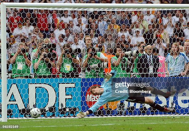 German goalkeeper Jens Lehmann dives for the ball during a penalty shootout in the 2006 FIFA World Cup Germany versus Argentina quarter-final soccer...