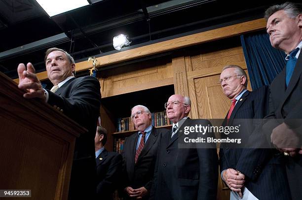 Representative Duncan L. Hunter speaks while, from left to right, Representatives James F. Sensenbrenner , Vernon J. Ehlers , Senator Harry Reid ,...