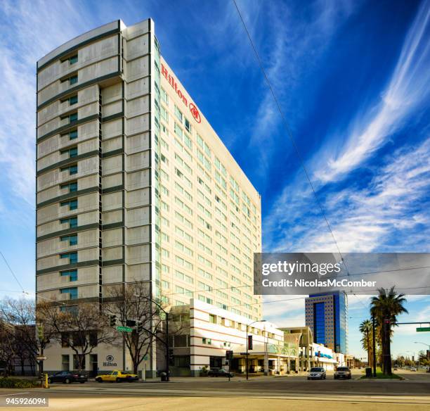 san jose san carlos and almaden boulevard intersection with hilton hotel - hilton americas hotel stock pictures, royalty-free photos & images