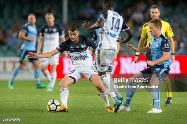 Melbourne Victory midfielder Terry Antonis turn away from Sydney FC midfielder Brandon O'Neill at the A-League Soccer Match between Sydney FC and...