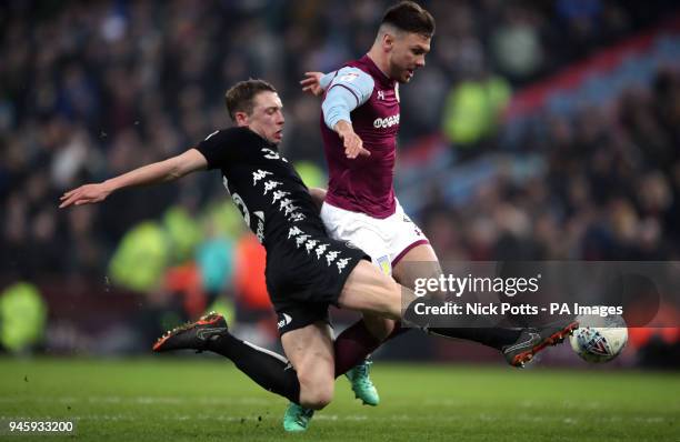 Leeds United's Matthew Pennington tackles Aston Villa's Scott Hogan during the Sky Bet Championship match at Villa Park, Birmingham.