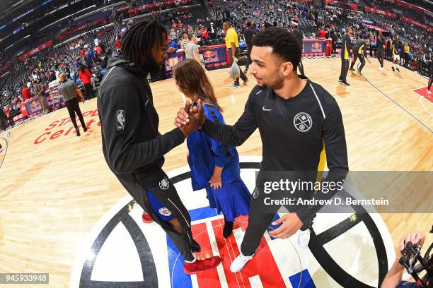 DeAndre Jordan of the LA Clippers and Gary Harris of the Denver Nuggets greet each other before the game between the two teams on April 7, 2018 at...