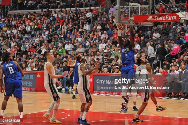Montrezl Harrell of the LA Clippers dunks the ball against the Denver Nuggets on April 7, 2018 at STAPLES Center in Los Angeles, California. NOTE TO...