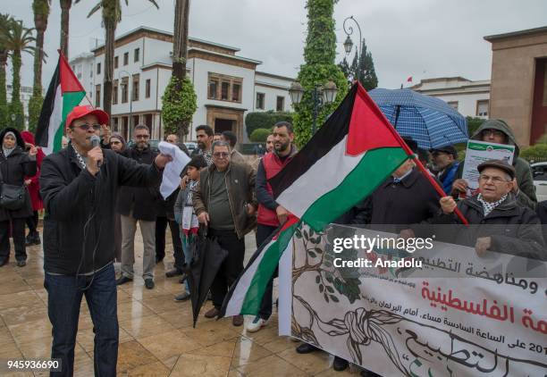 Group of people gather during a demonstration in support of the "Great March of Return", which was organized to mark the 42nd anniversary of the Land...