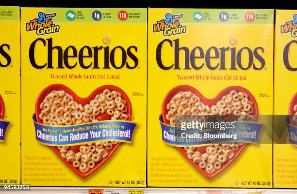Boxes of General Mills Cheerios cereal sit on a grocery store shelf in New York, Thursday, June 29, 2006. General Mills Inc. Said fourth-quarter...