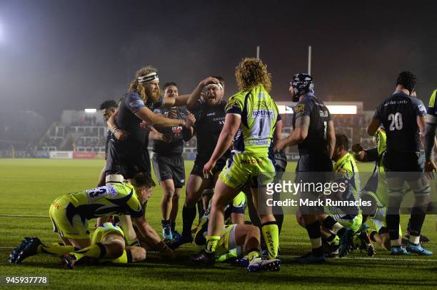 Newcastle Falcons celebrate a try in the final moments of the Aviva Premiership match between Newcastle Falcons and Sale Sharks at Kingston Park on...