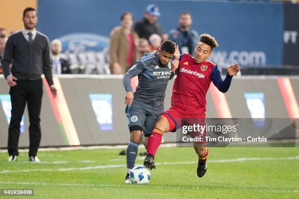 April 11: Ismael Tajouri-Shradi of New York City is challenged by Adam Henley of Real Salt Lake challenge for the ball during the New York City FC Vs...