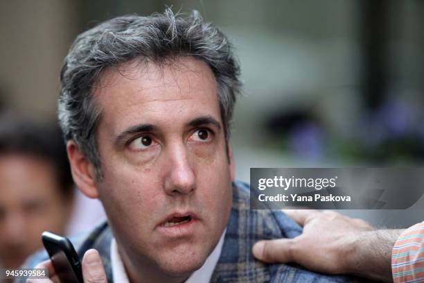 Michael Cohen, U.S. President Donald Trump's personal attorney, takes a call near the Loews Regency hotel on Park Ave on April 13, 2018 in New York...