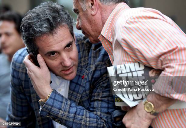 Michael Cohen , U.S. President Donald Trump's personal attorney, takes a phone call as he sits outside near the Loews Regency hotel on Park Ave on...